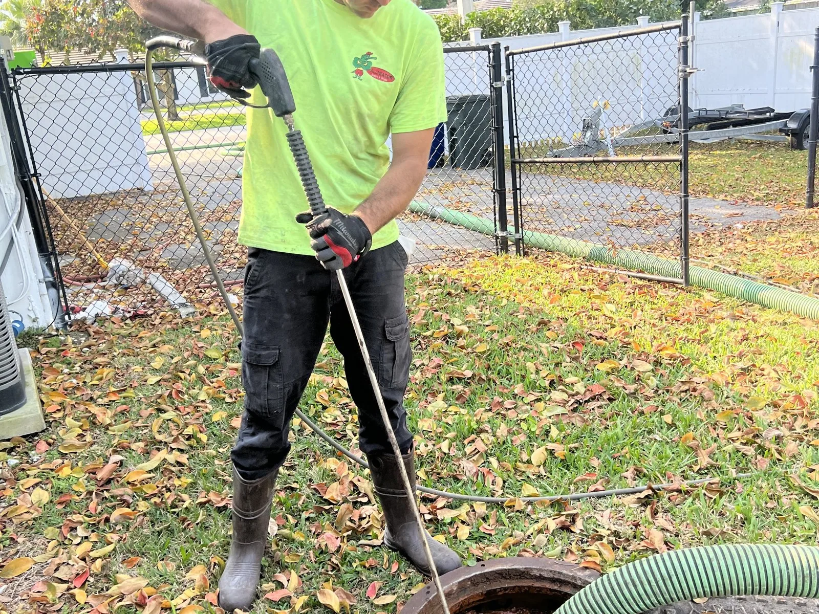 Septic line clearing work in progress on a South Florida service call